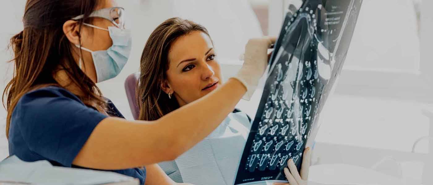 woman looking at x-ray