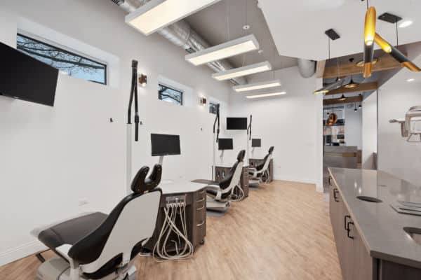 Row of orthodontic treatment chairs